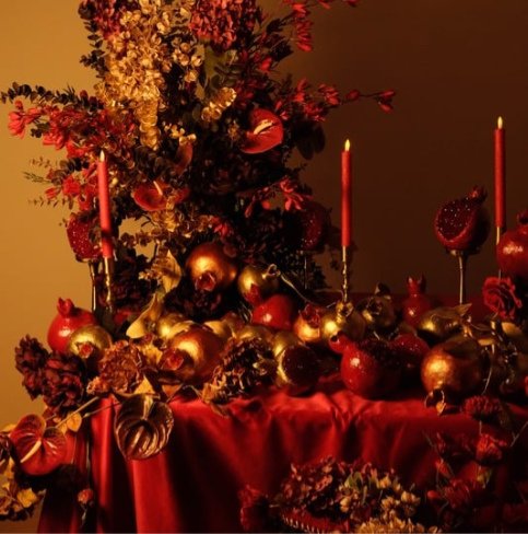 Handcrafted pomegranate abundance table décor