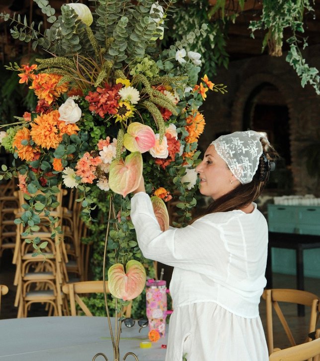 Tea Geliashvili arranging a floral installation